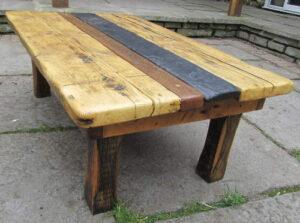 Slate, teak and pine topped coffee table